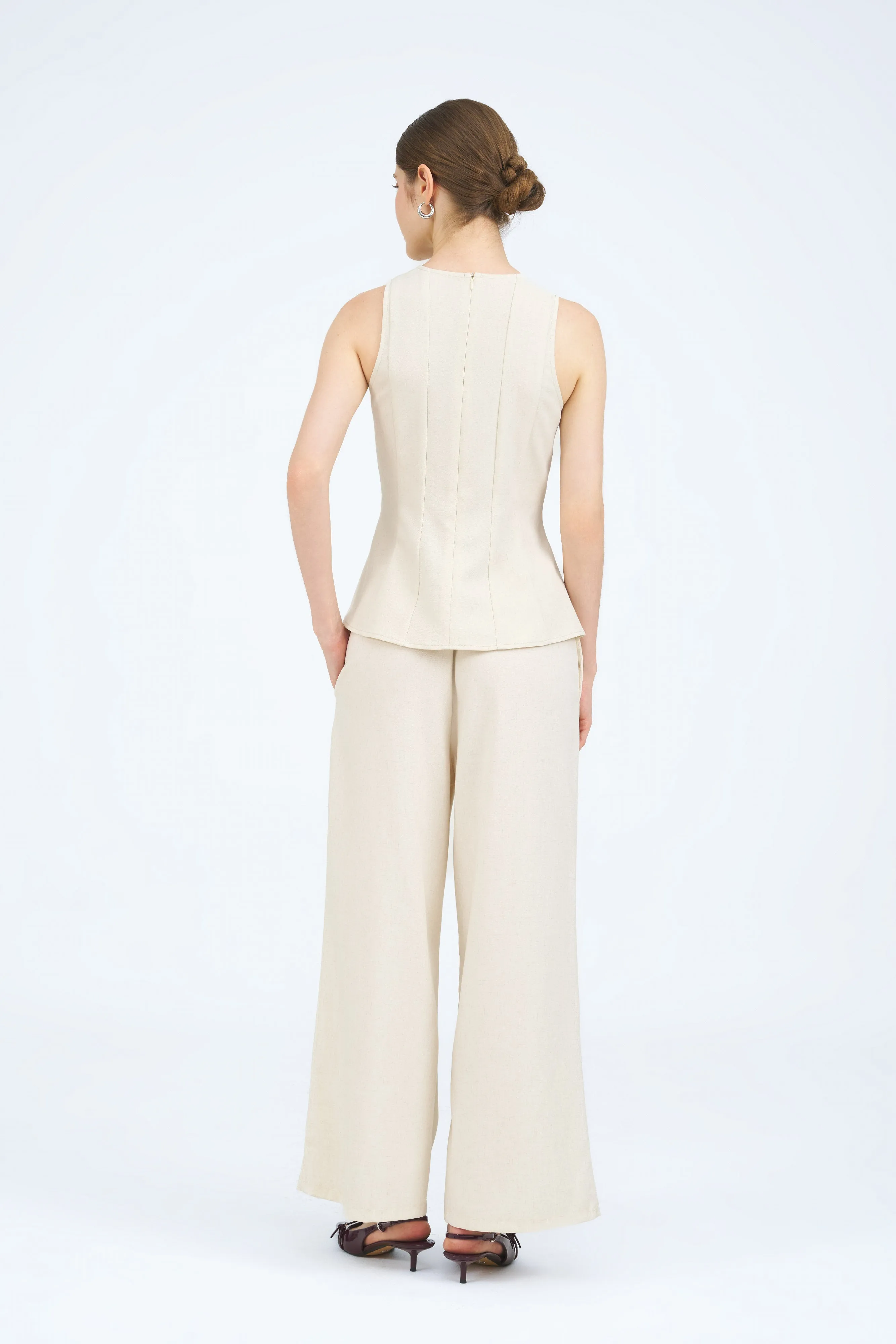 [Backorder] Danika Sleeveless Peplum Panel Top in Ivory Beige