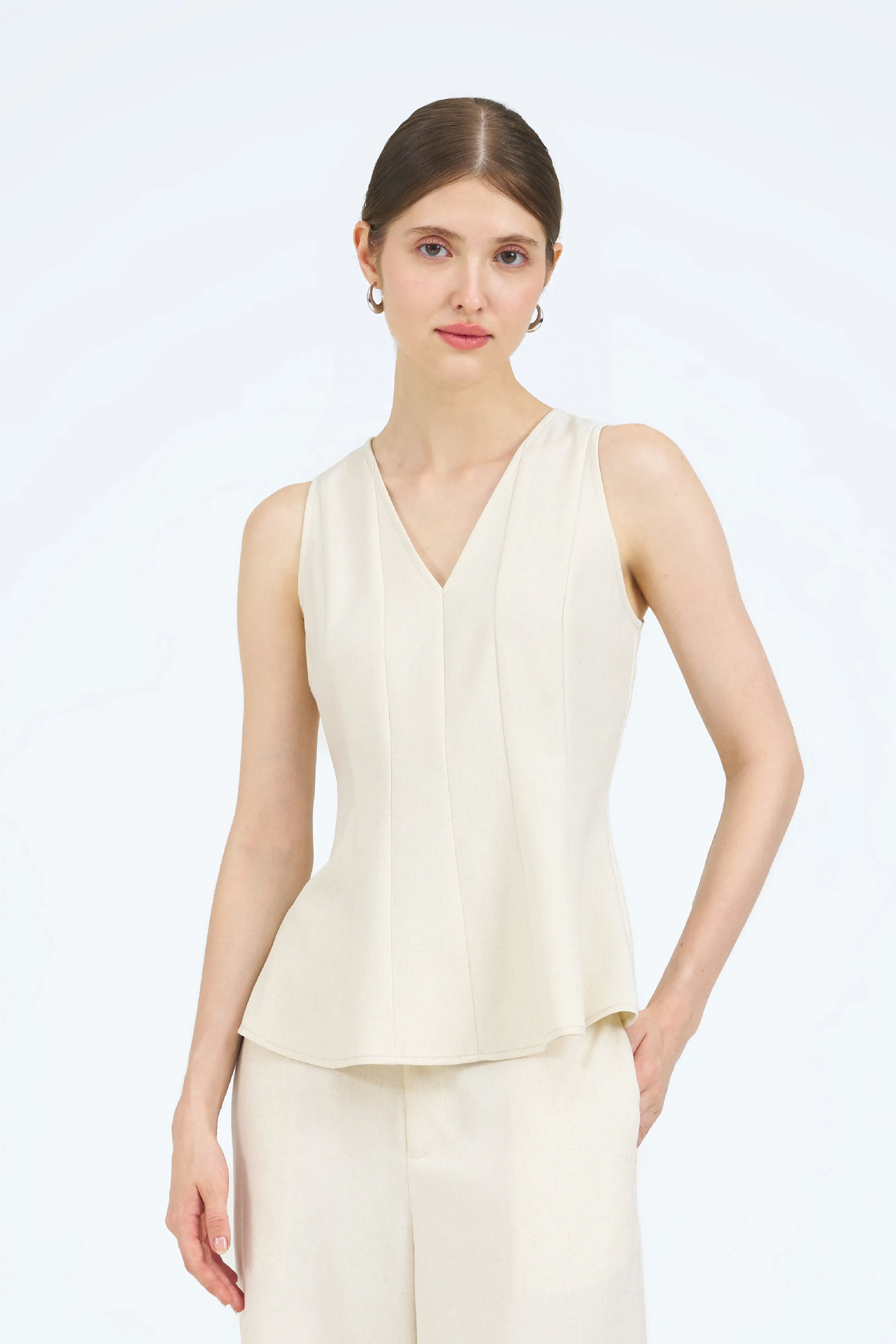 [Backorder] Danika Sleeveless Peplum Panel Top in Ivory Beige