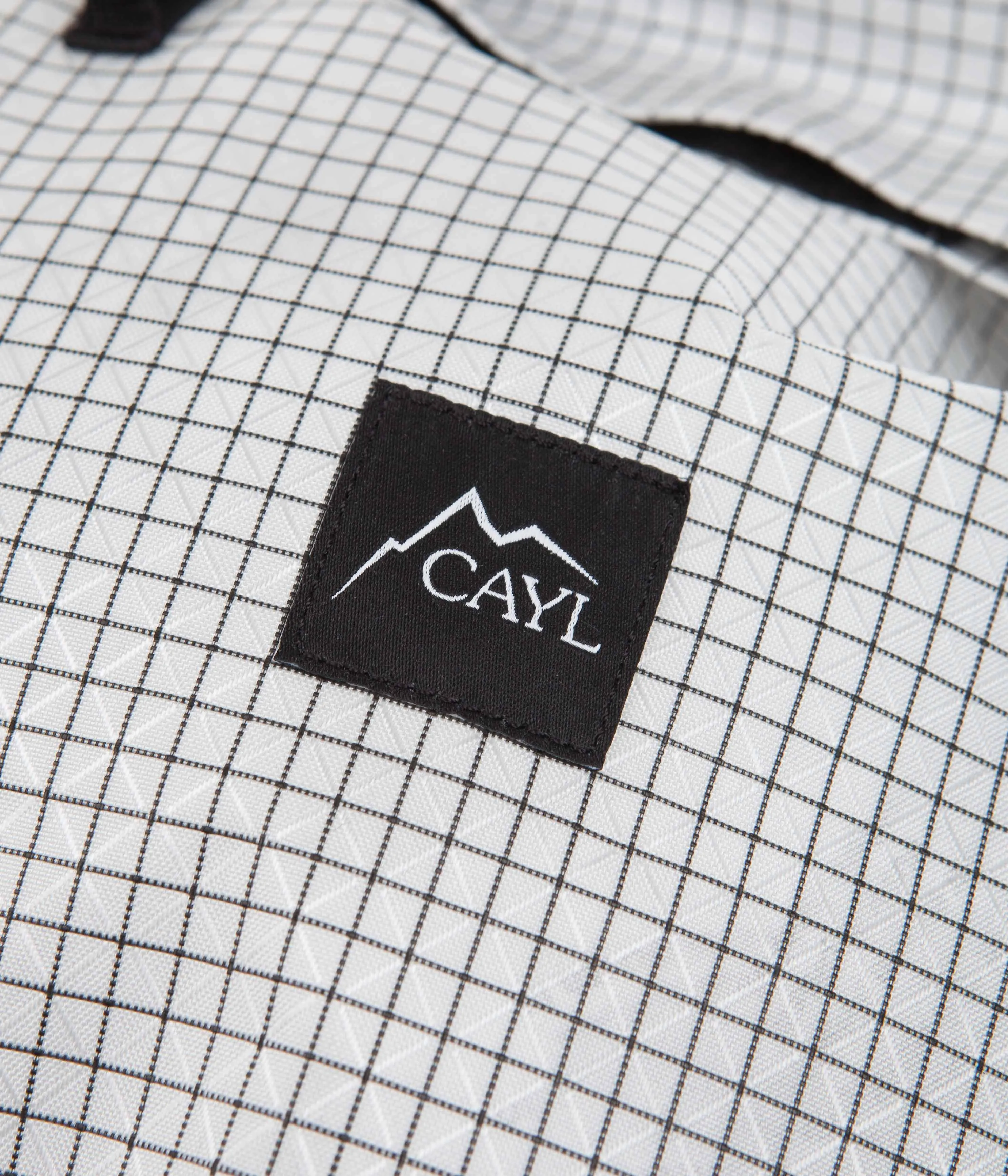 Cayl Mari Roll Top B-Grid Bag - White