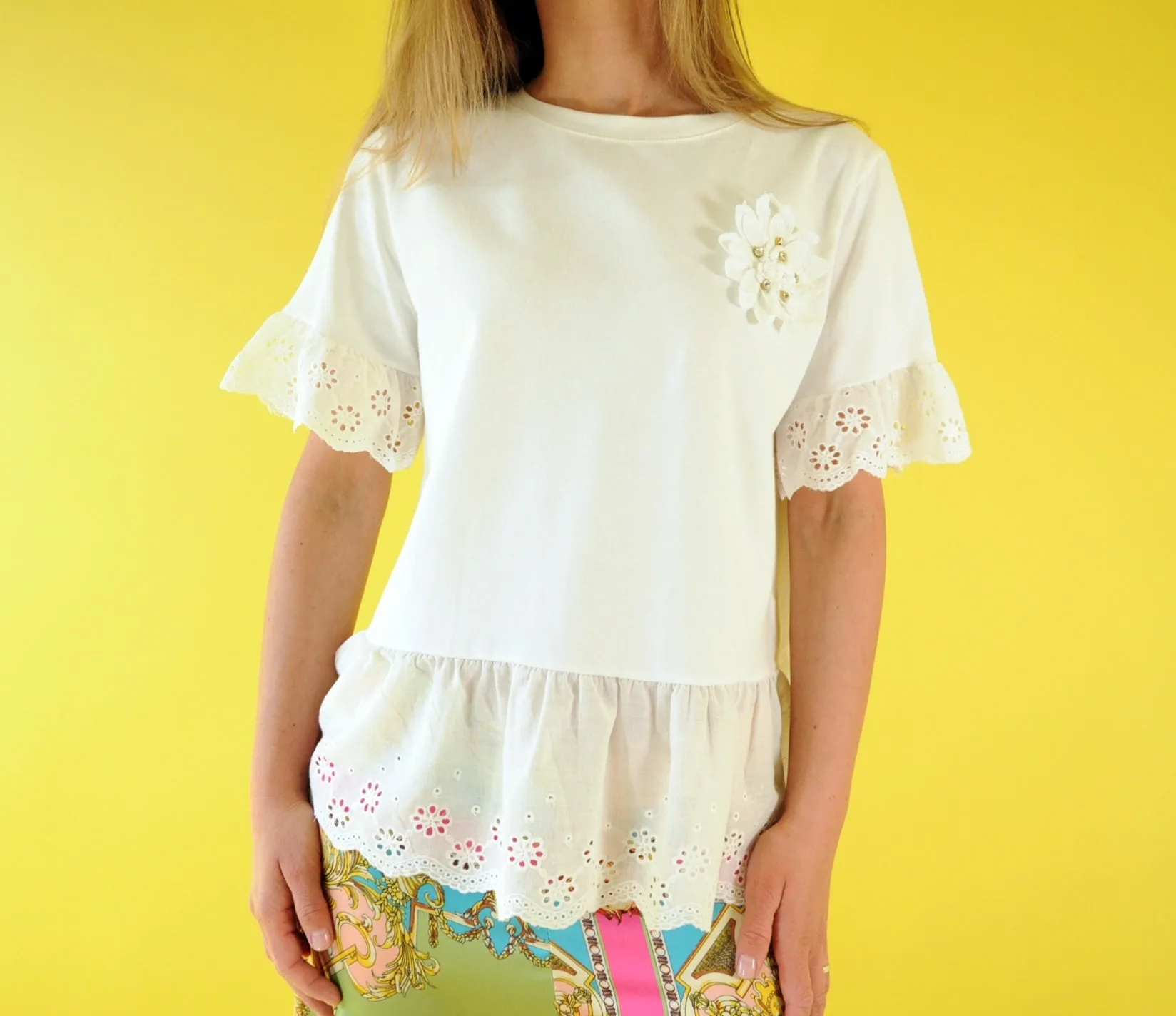 Off white broderie anglaise frilled peplum tee with 3D gem flower detail