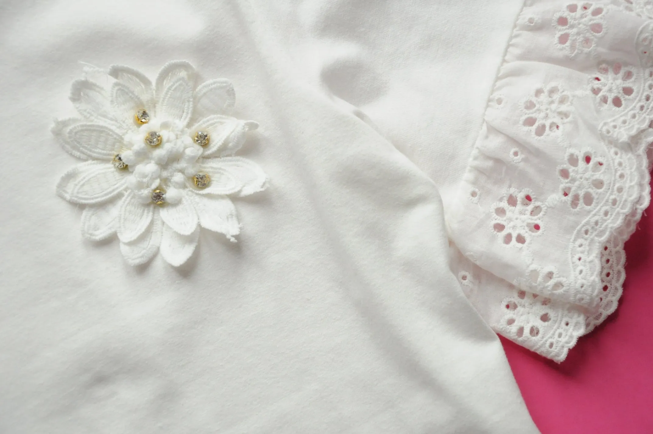 Off white broderie anglaise frilled peplum tee with 3D gem flower detail