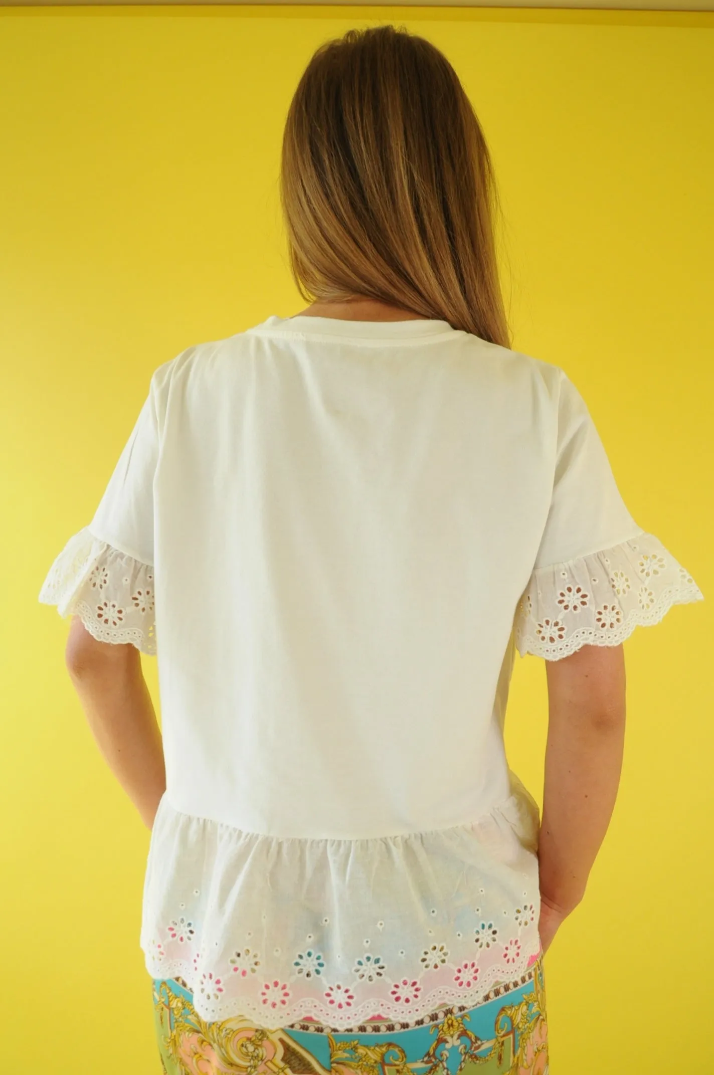 Off white broderie anglaise frilled peplum tee with 3D gem flower detail